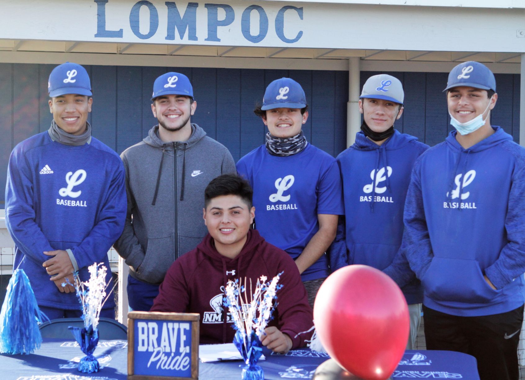 111220 Espinoza signs 16.JPG
